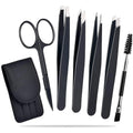 Six-piece stainless steel eyebrow tweezers set with curved scissors, brush, and leather case.