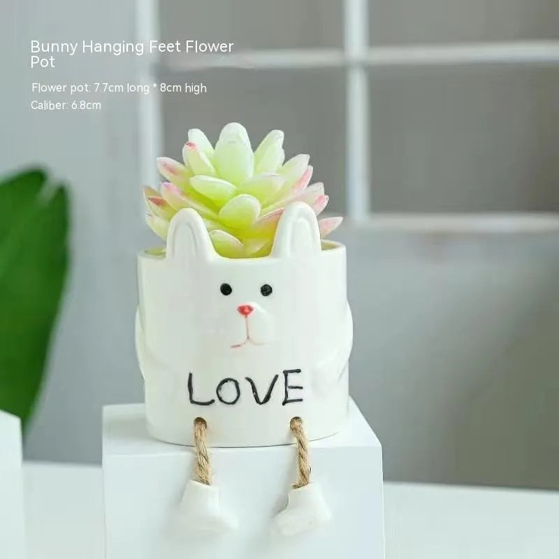 Ceramic hanging foot flowerpot in cartoon style for succulent plants on desktop