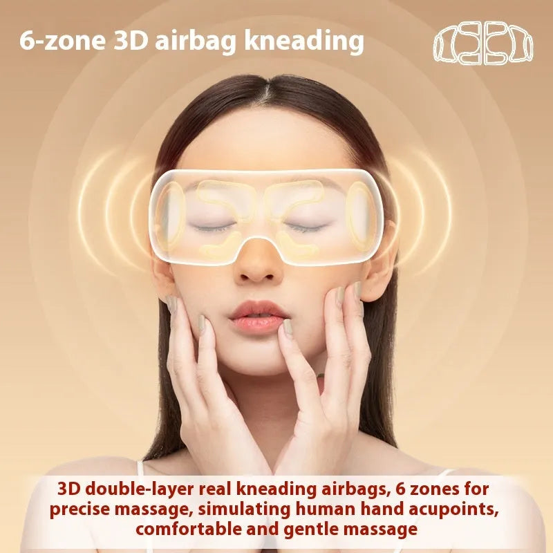 White rechargeable eye massager with airbag massage and hot compress functions