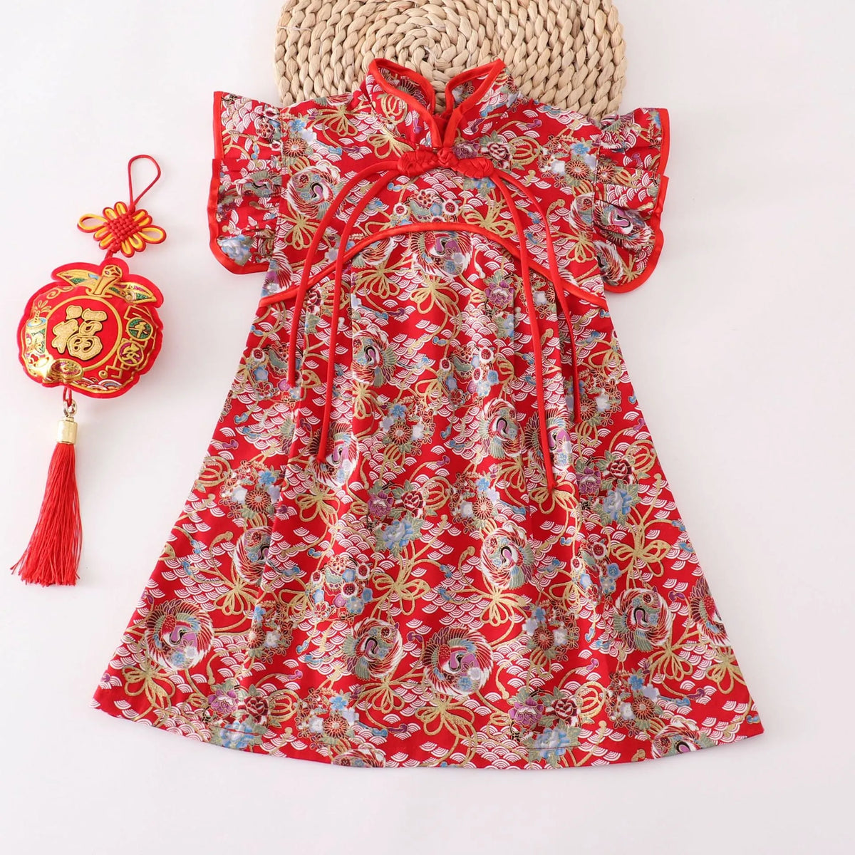 Girls Chinese style cotton dress in red small floral with splicing detail, available in heights 80cm to 150cm.