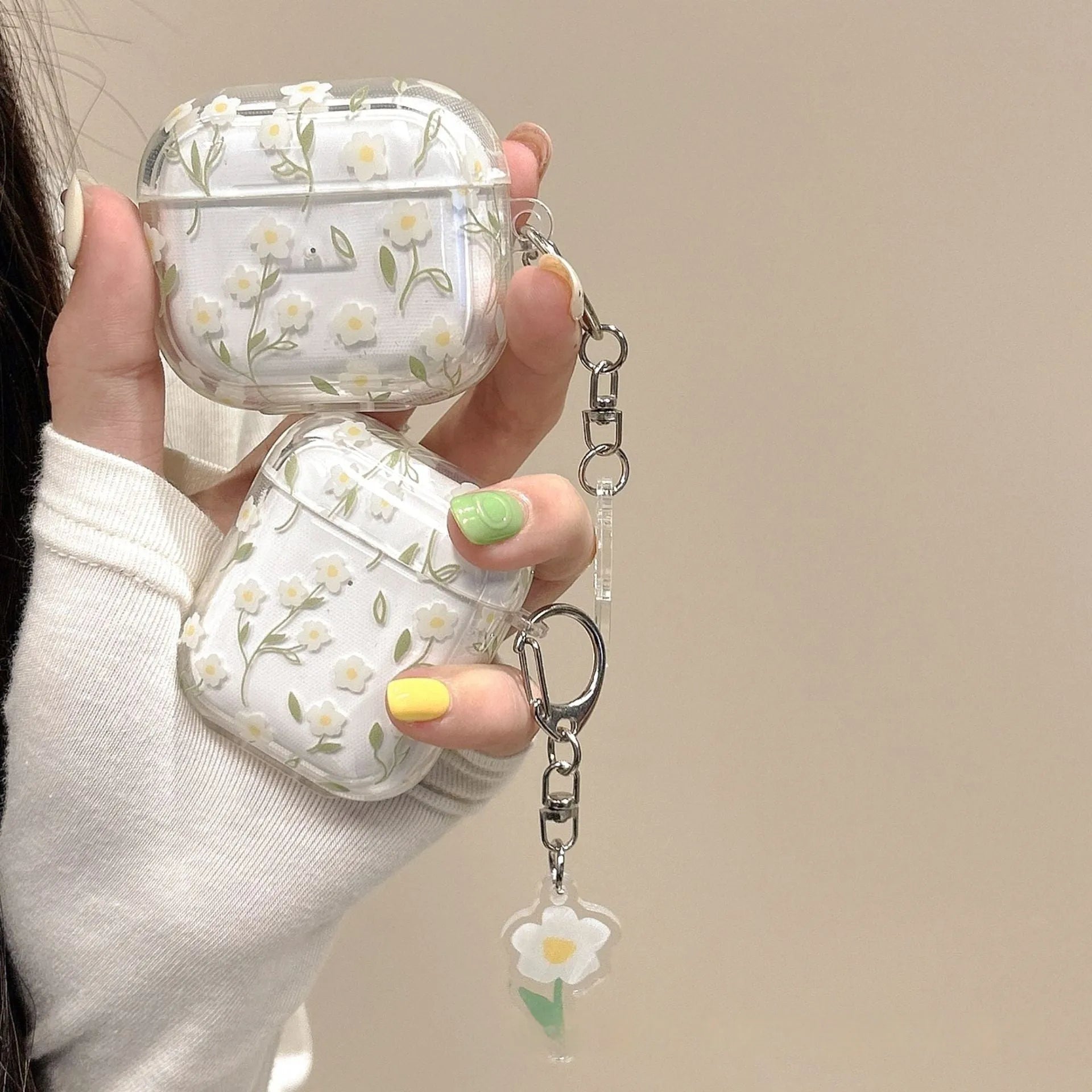 White floral pattern on a transparent TPU protective case for Apple AirPods