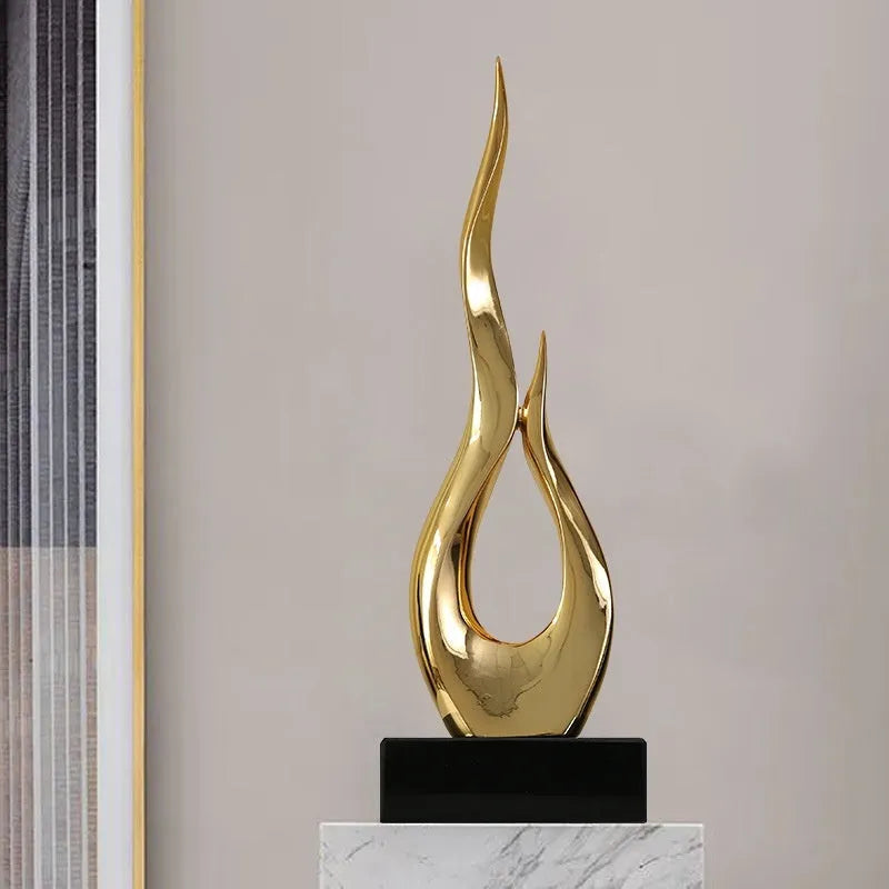 Modern resin festival decoration ornament in bright gold colour with handmade craftsmanship details