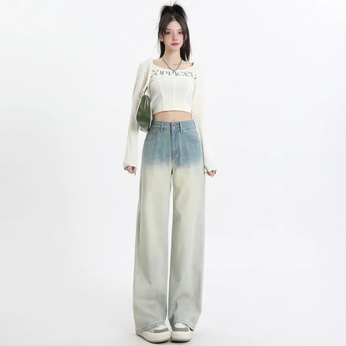 Women's gradient blue straight-leg jeans showing colour transition from lighter to darker blue tones