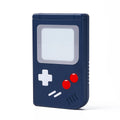Hard plastic Nintendo Switch game card storage box in blue colour, shown next to game cartridges.