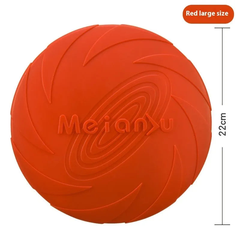 Soft rubber dog frisbee toy for outdoor fetch and walking in blue, green, or red colours.
