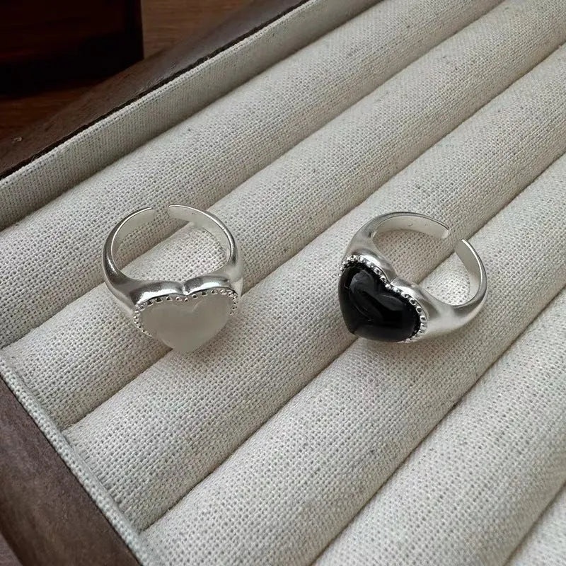 Adjustable heart-shaped sterling silver ring with black agate stone centrepiece