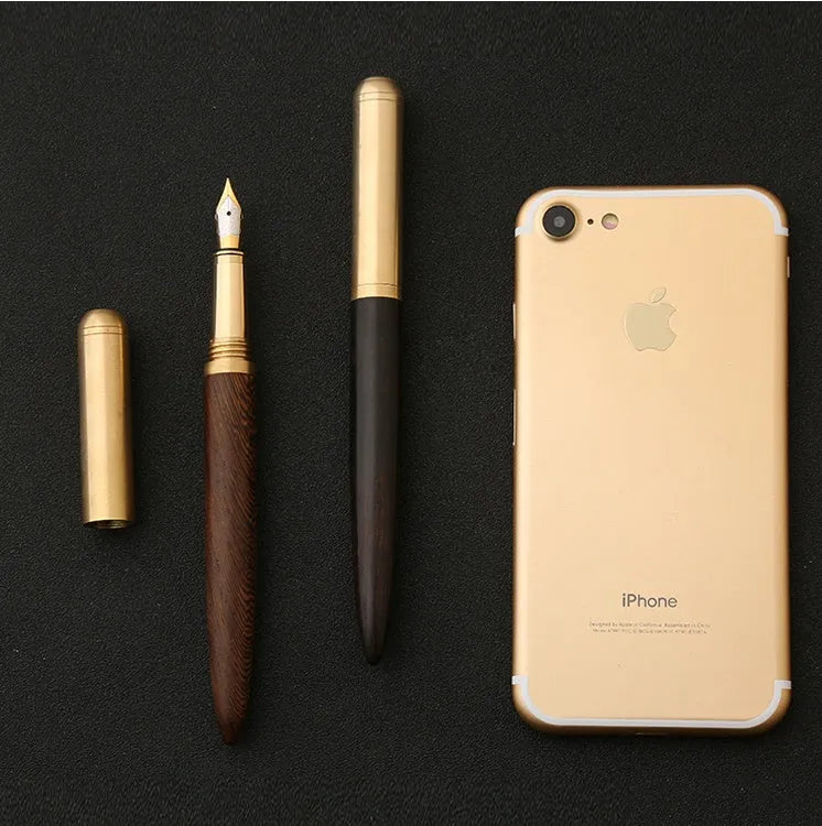 Brass and sandalwood fountain pen with 0.7mm nib on white background
