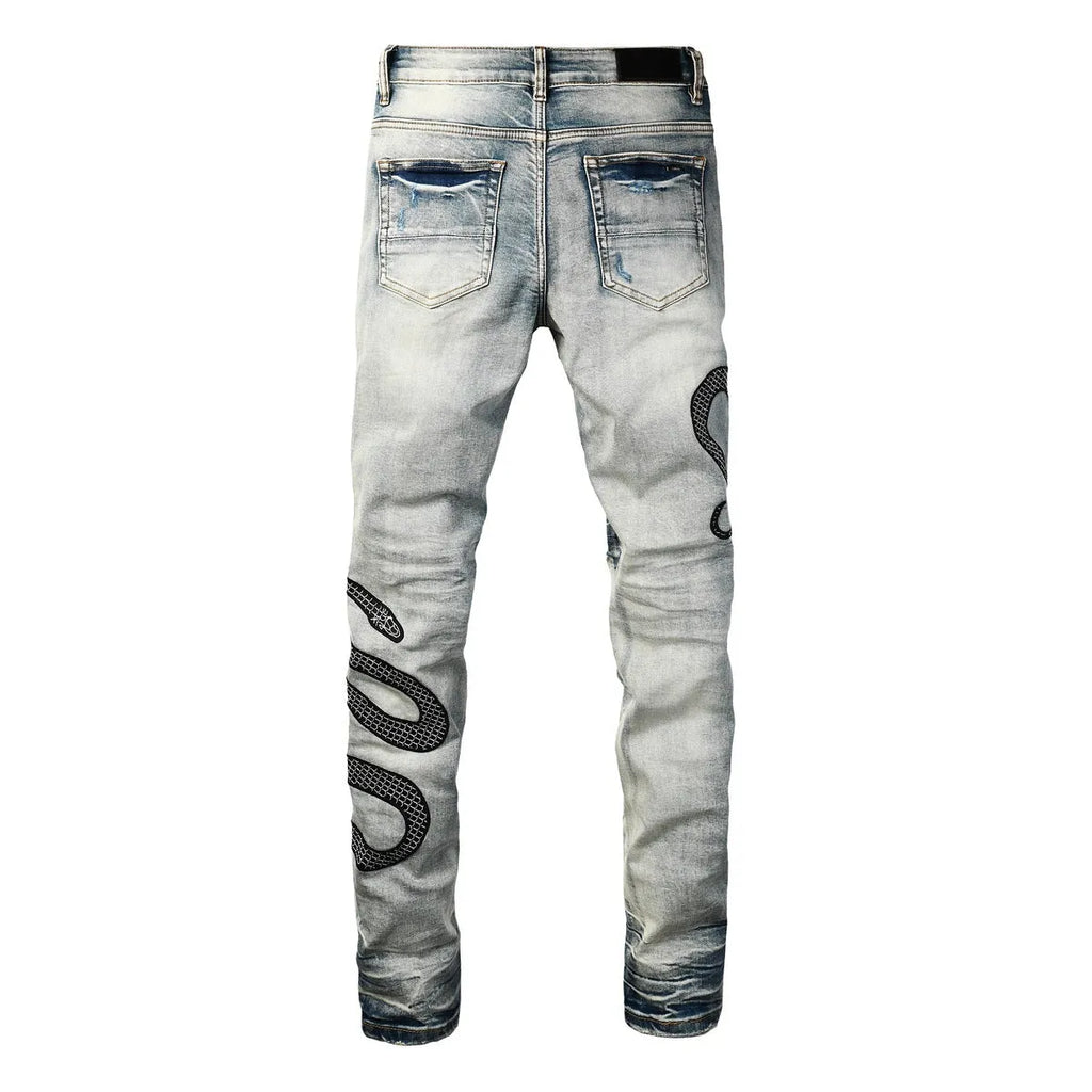 Blue distressed wash skinny jeans with mid waist and skinny leg silhouette