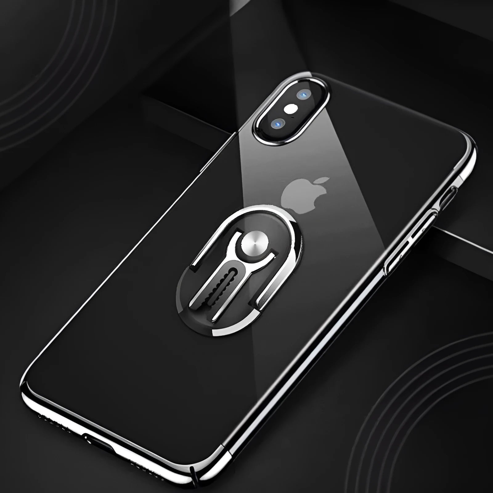Universal car mobile phone bracket with ring holder and suction cup mount in black, shown holding a smartphone.