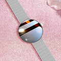 Women's smart watch with circular colour screen and metal wrist strap on wrist