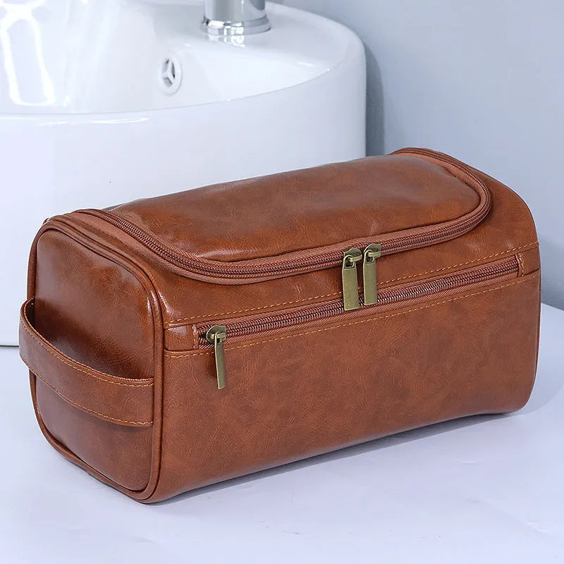 Large capacity waterproof makeup bag in Pu leather available in six colour options including black, navy, beige and brown