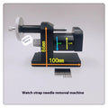 Alloy steel watch strap removal machine tool on a bench, showing compact size and components.