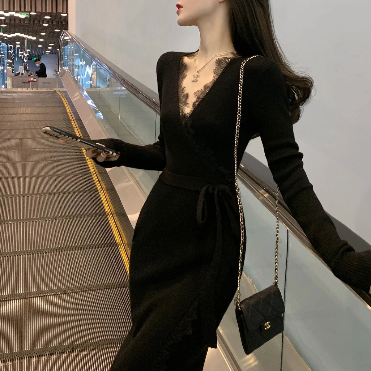 Black women's slim fit woolen skirt with princess dress design on a mannequin
