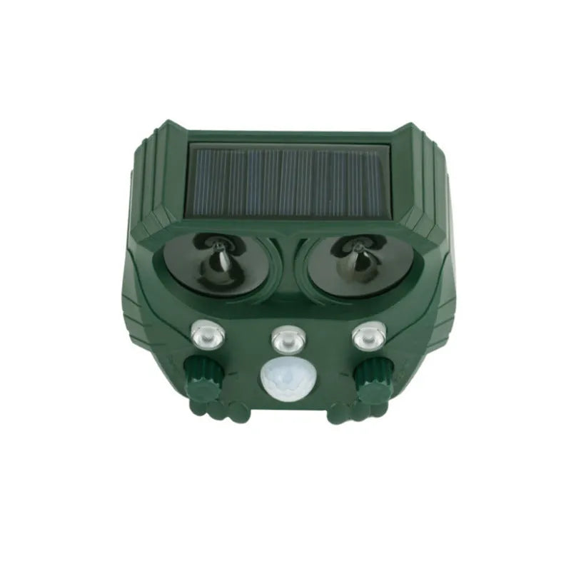 Green solar ultrasonic animal repeller unit showing dimensions and outdoor installation.