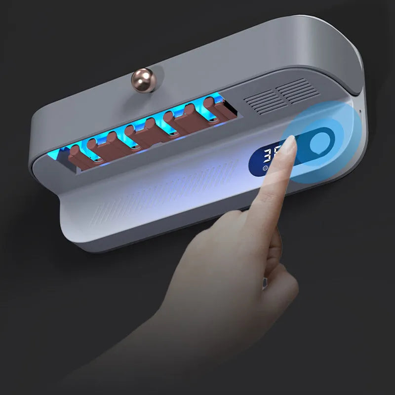 White wall-mounted smart toothbrush sterilizer with USB charging port and button controls