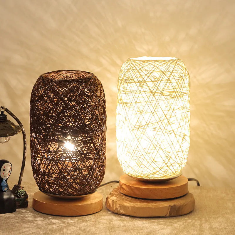 Brown hemp rope desk lamp with spherical shade on circular wood base