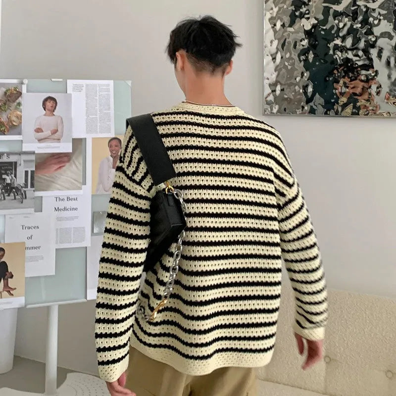 Men's black loose fit long sleeve sweater cotton blend on model front view