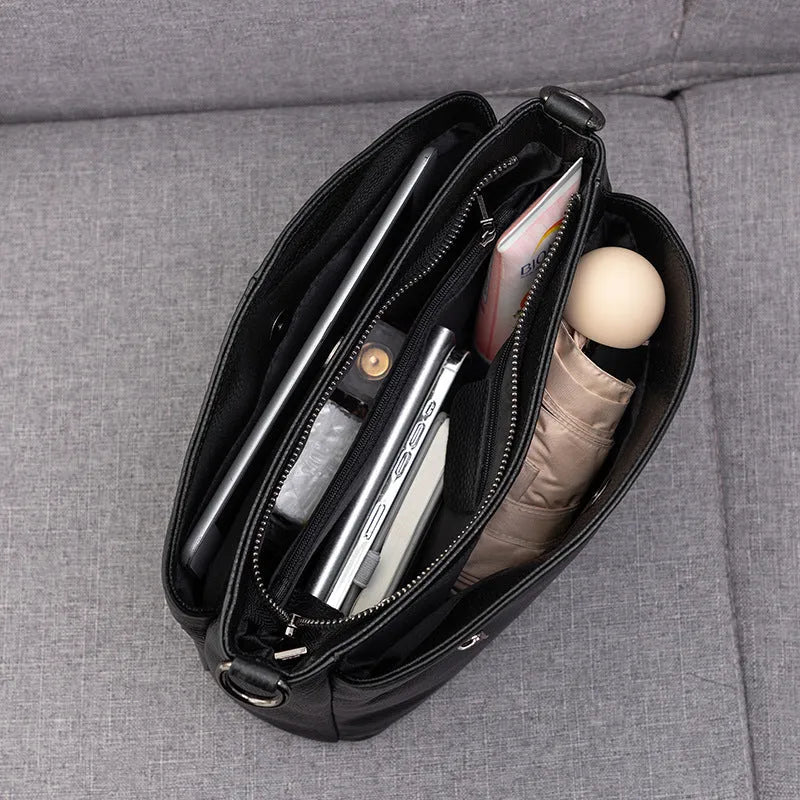 Genuine leather handbag with plaid pattern, single strap, horizontal square shape, medium soft.