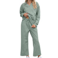 Women's two-piece rayon jacquard knit suit with geometric pattern, long sleeve top and elastic waist cropped trousers