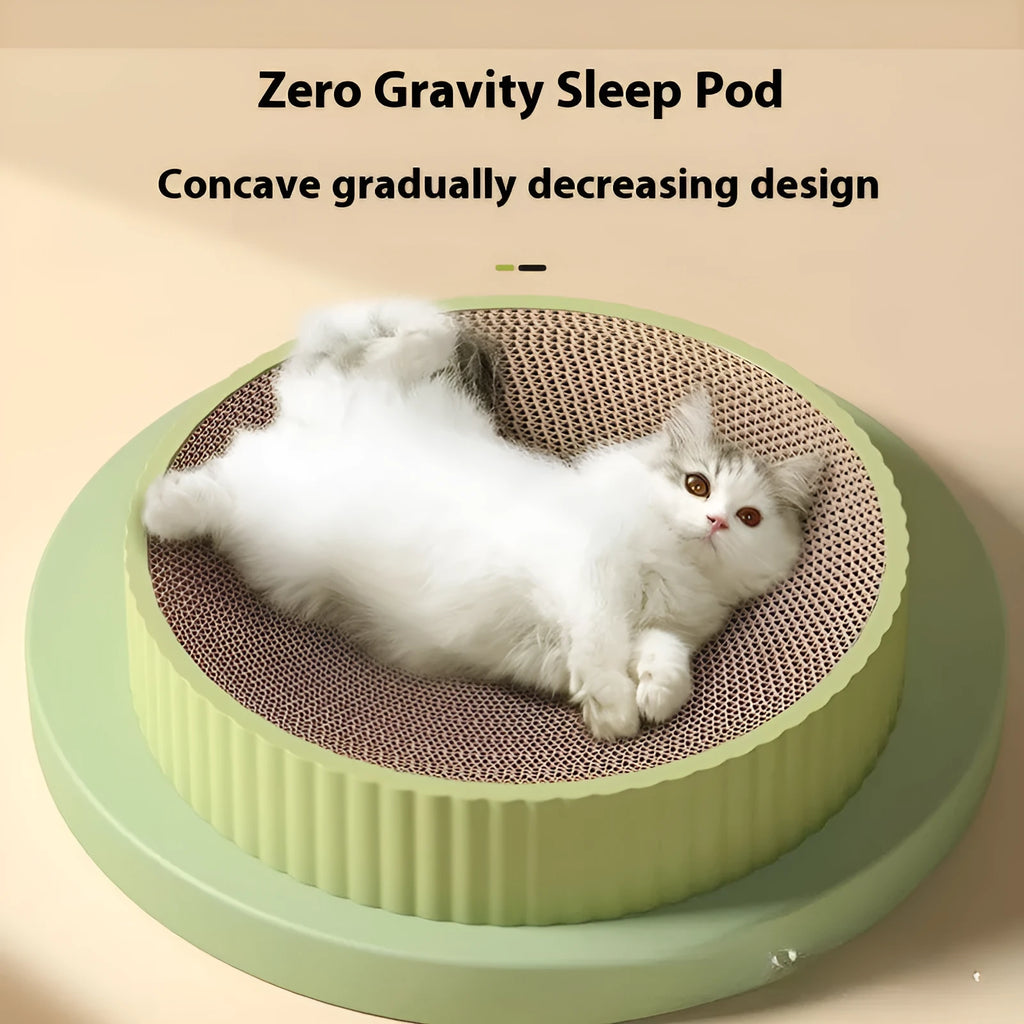 Round green cat scratching board and nest with replaceable corrugated cardboard surface, 55 cm diameter.