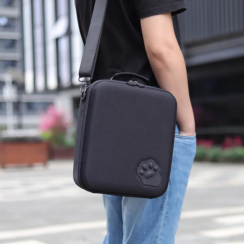 Nintendo Switch game storage bag in black, blue, or pink with shoulder strap.