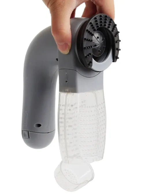 Grey handheld pet grooming vacuum cleaner with soft rubber head for dogs and cats