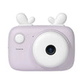 A2 Macaron-style kids digital camera in green, showing its dual lenses and 2.4-inch screen.