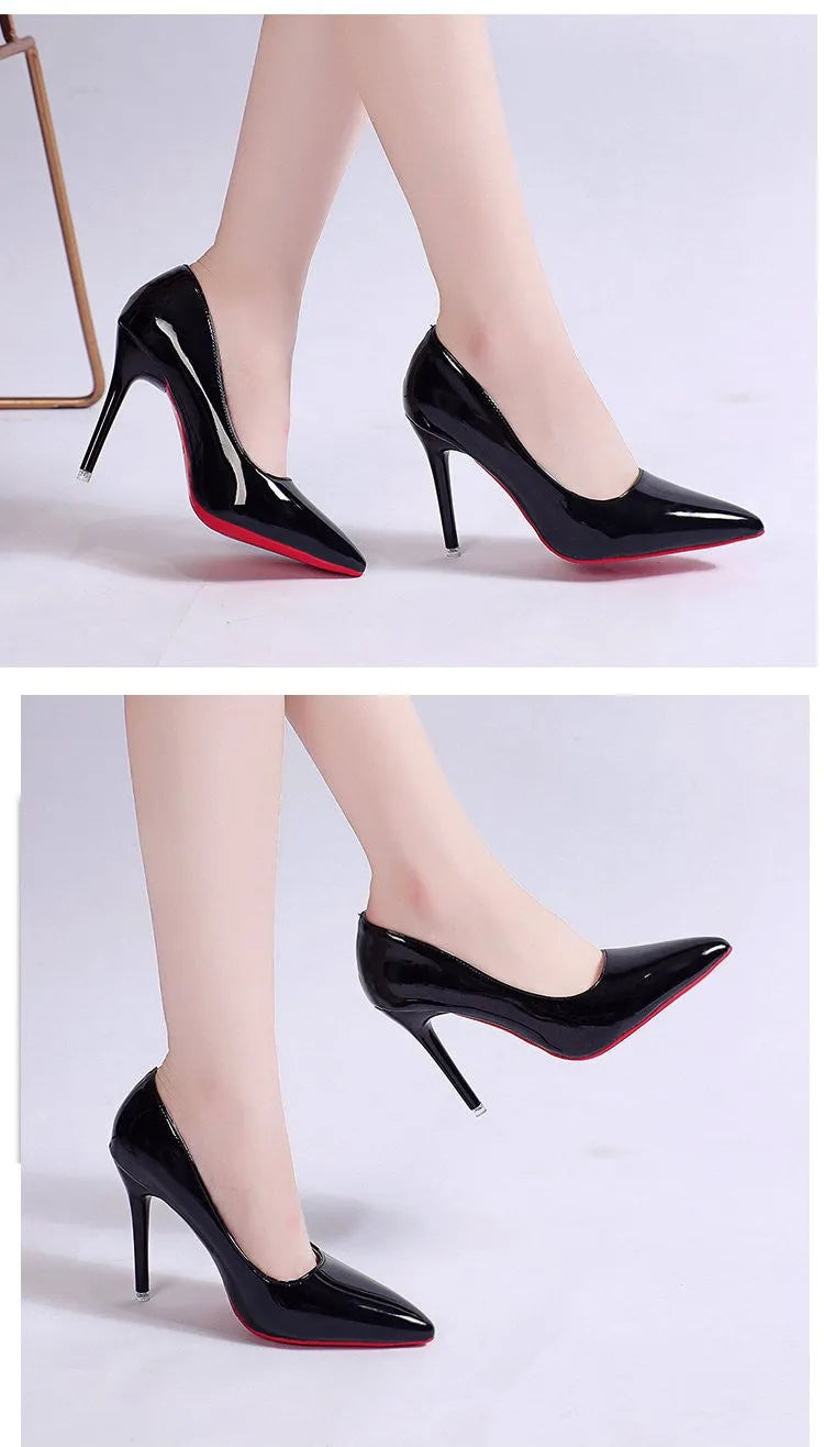 Women's black pointed toe stiletto pump with a shallow mouth on a rubber sole.