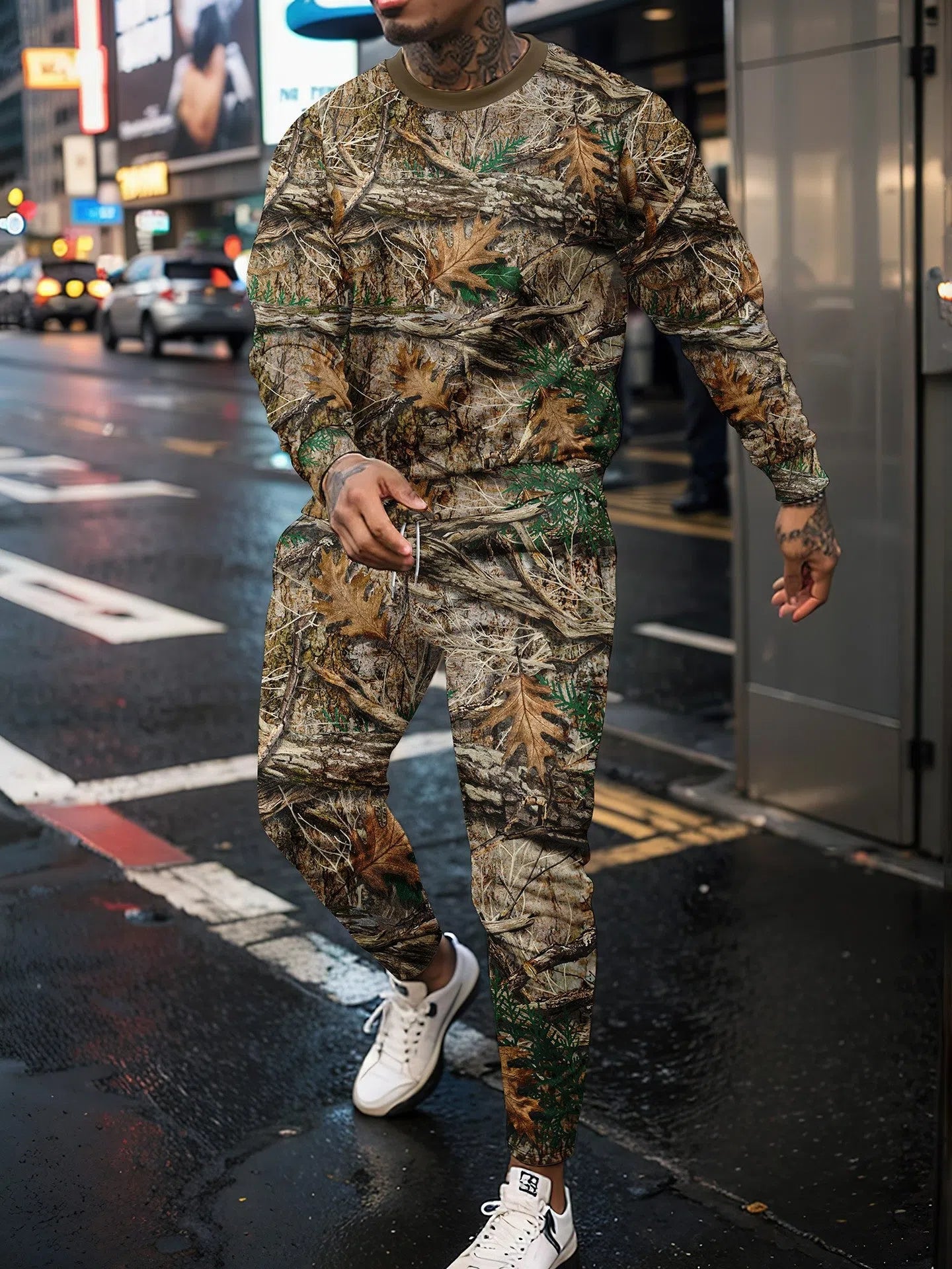 Two-piece jungle camouflage sportswear set with long-sleeve round neck top and matching trousers on a male model