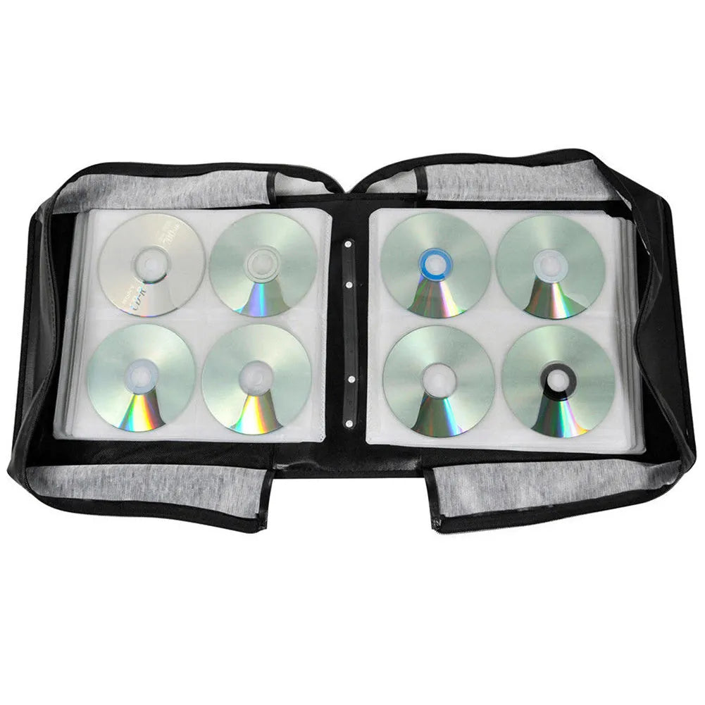 Black Oxford fabric CD DVD storage binder with top carry handle and zipper closure.