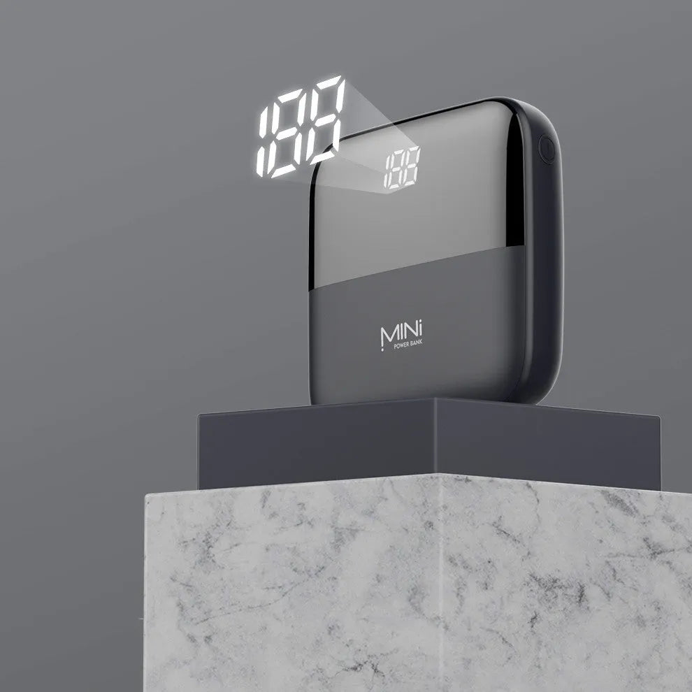 10000mAh portable power bank with digital display showing battery percentage
