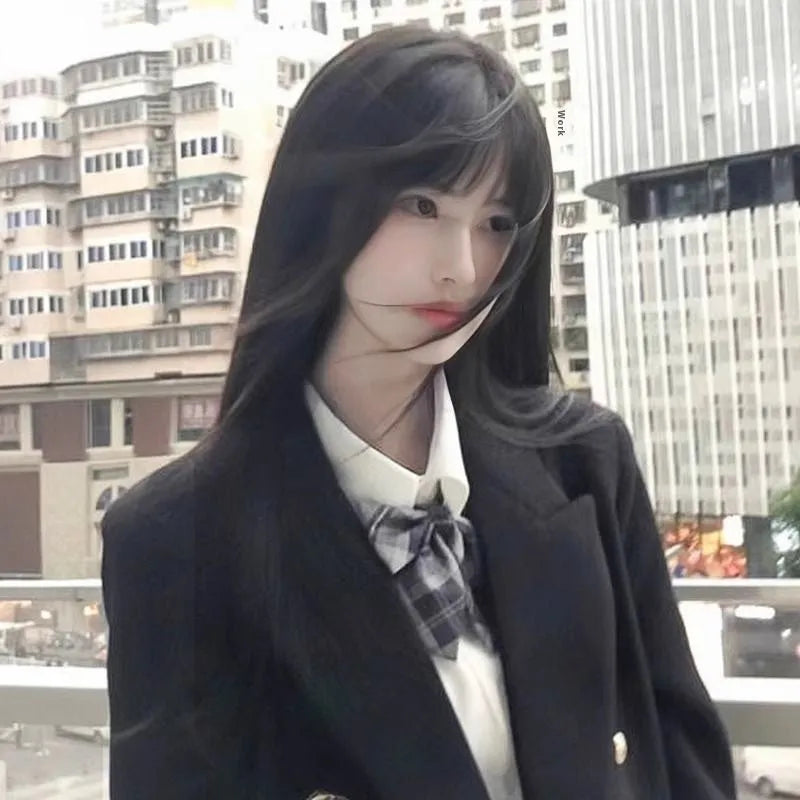 A long straight black synthetic wig with bangs, shown in brown black and cold brown colour options.