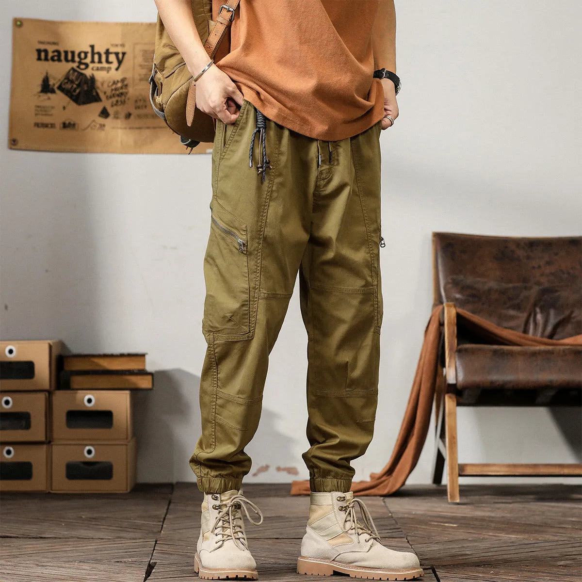 Men's loose-fit cotton harem pants in a solid colour with ankle bands and a mid waist.