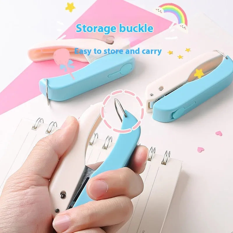 Small manual handheld embossing punch tool with four metal dies: Love, Star, 4mm and 6mm round dots.