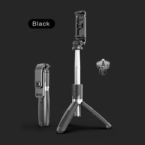 Extended black Bluetooth selfie stick with phone attached, showing wireless remote and tripod base deployed.