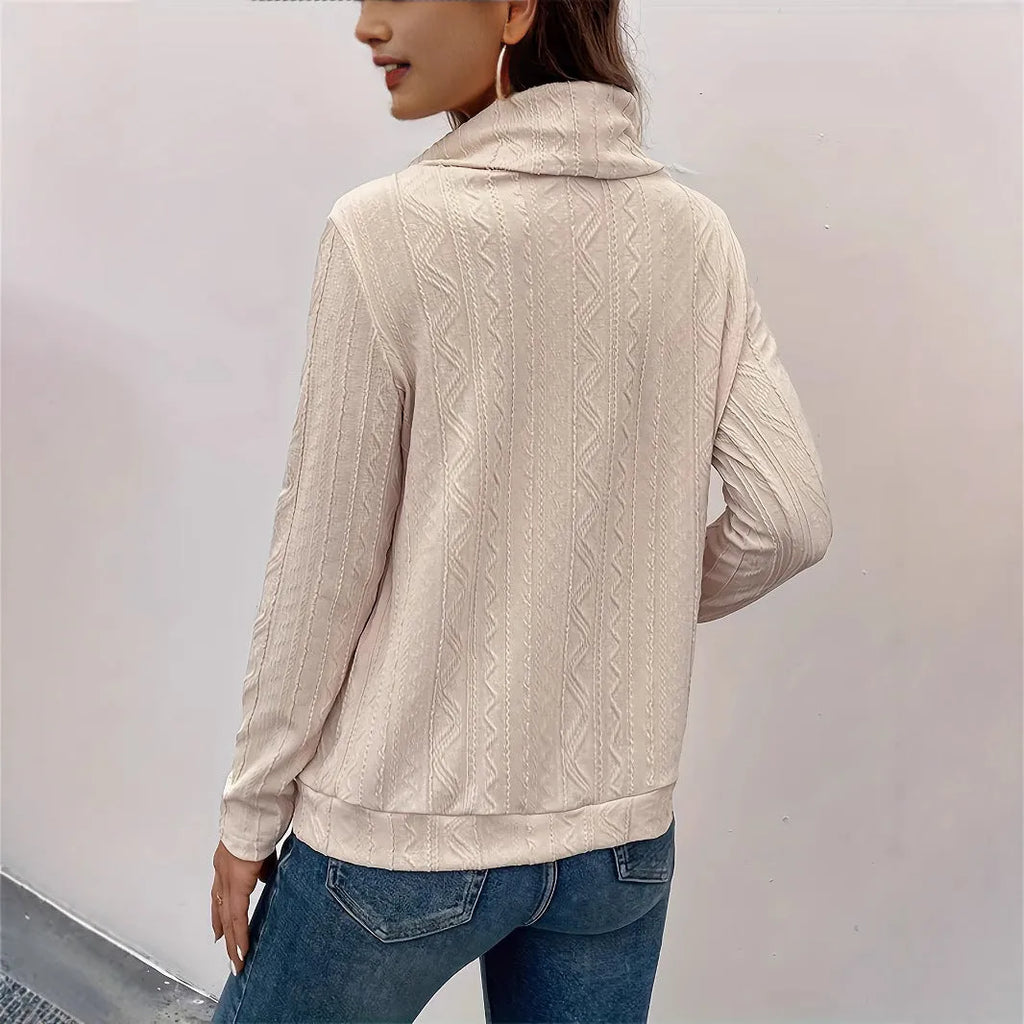 Apricot coloured hooded pullover sweater with long sleeves and drawstring hood