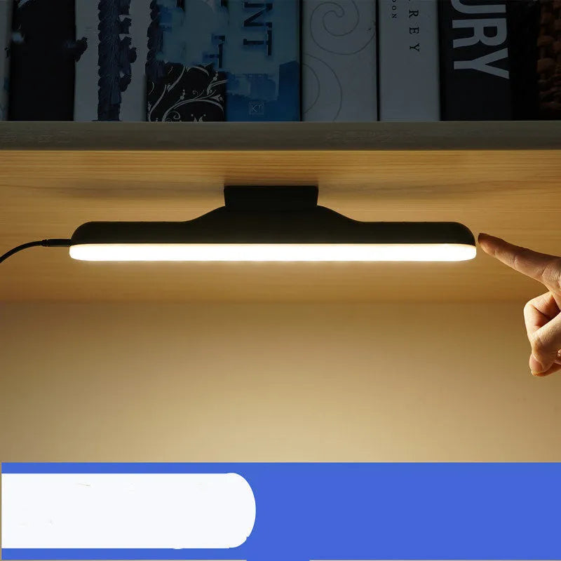 Modern white LED desk lamp with touch controls and flexible gooseneck design on wooden desk