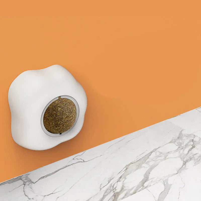 Catnip ball toy in fried egg and poached egg shapes with adhesive backing for wall and floor play