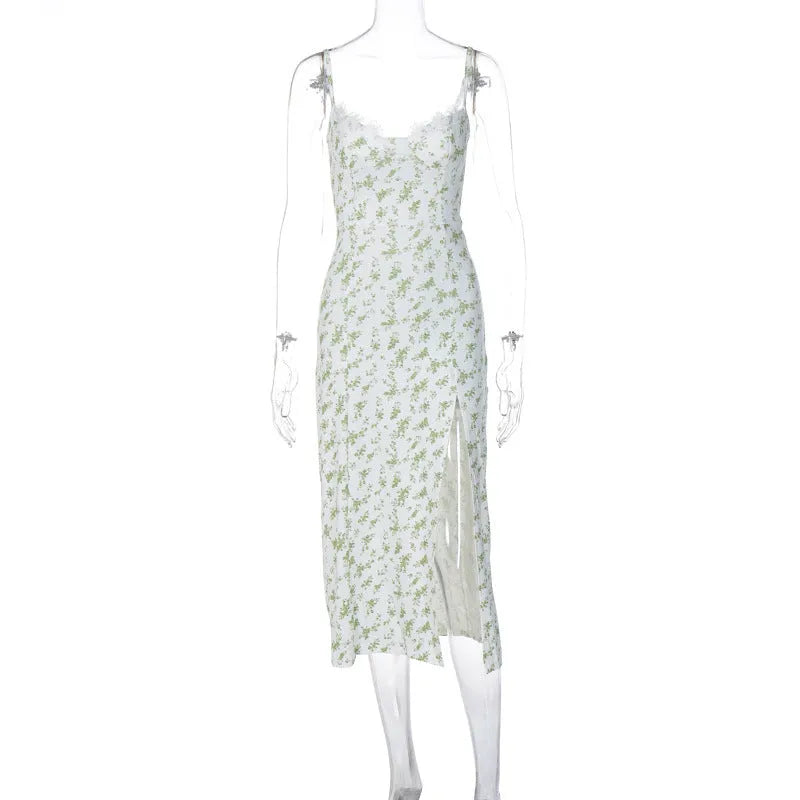 Women's blue lace print long dress with suspender straps and a thigh-high side slit.
