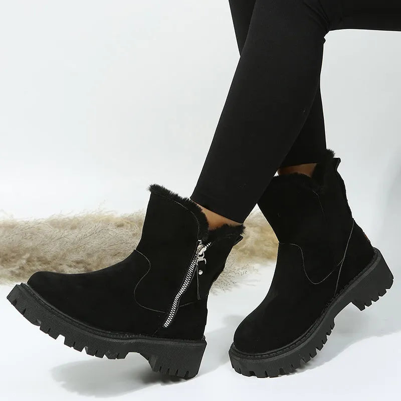 Women's black high-top snow boots with side zipper and faux fur lining shown alongside khaki colour option