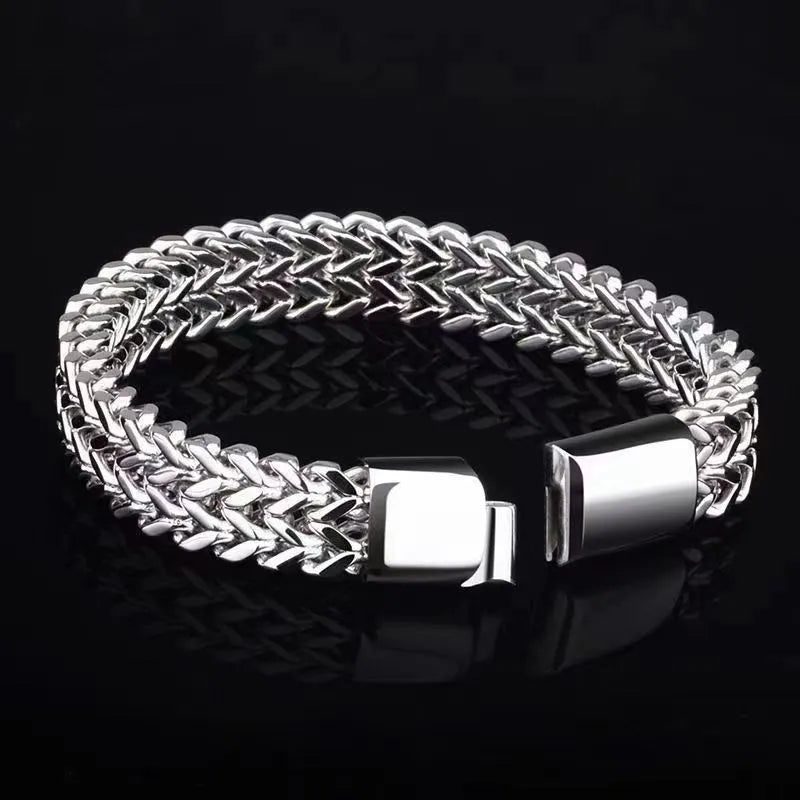 Silver titanium steel men's bracelet with geometric hip hop design on front and back.