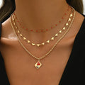 Adjustable three-layer clavicle chain necklace with geometric heart pendant in zinc alloy