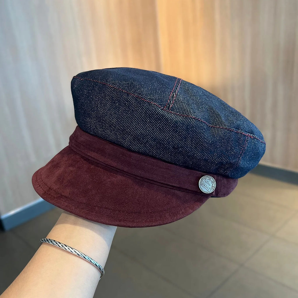 Dark blue denim newsboy hat with octagonal crown and contrasting brim