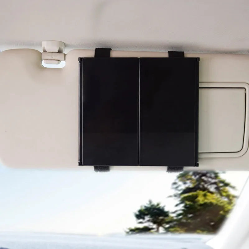 Silver car folding makeup mirror shown closed at 15.5cm wide and opened to 30.5cm wide