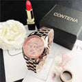 Women's quartz watch with metal mesh strap and crystal-accented dial in rose gold