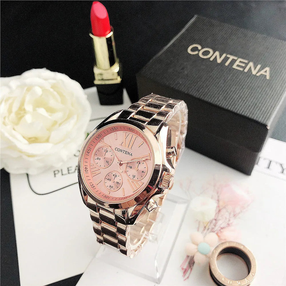 Women's quartz watch with metal mesh strap and crystal-accented dial in rose gold