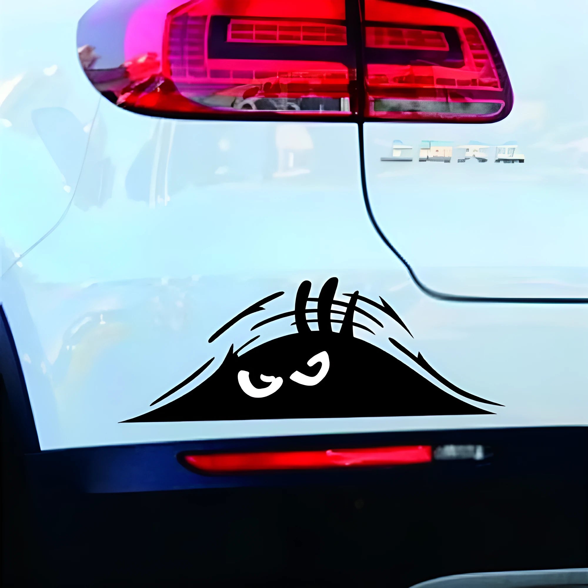 Four designs of self-adhesive body stickers on skin, showing colourful smiley, black smiley, white smiley, and black angry faces.