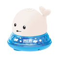 Automatic spray whale bath toy with LED lights floating in water