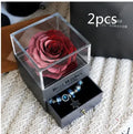 Eternal flower gift box with preserved roses and carnations measuring 8.5 cm square by 10.5 cm high