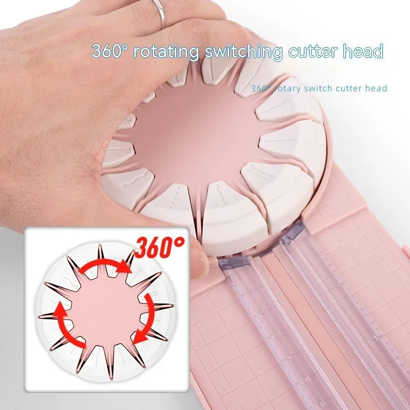 12-in-1 plastic paper cutting machine with dotted board in pink or black, measuring 46.2 cm long